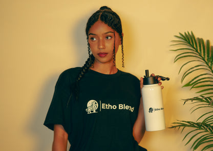 Stainless steel water bottle with a straw lid